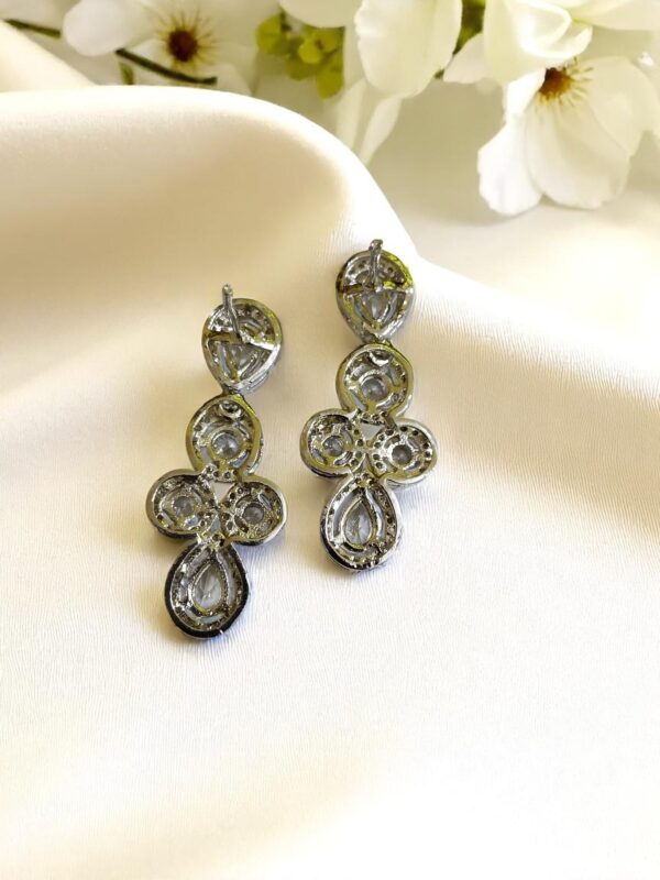 White Ad Stone Earring Pair - Image 3