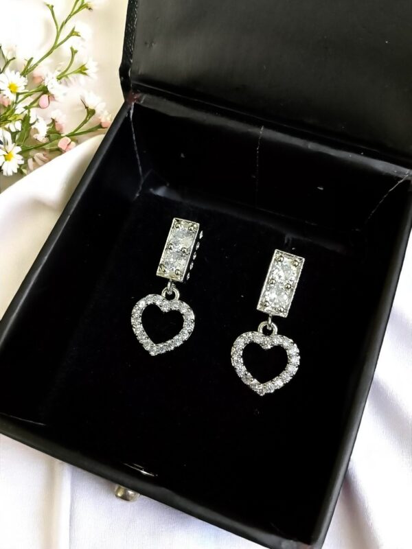 White Ad Stone Earring Pair - Image 3