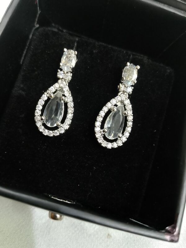White Ad Stone Earring Pair - Image 2