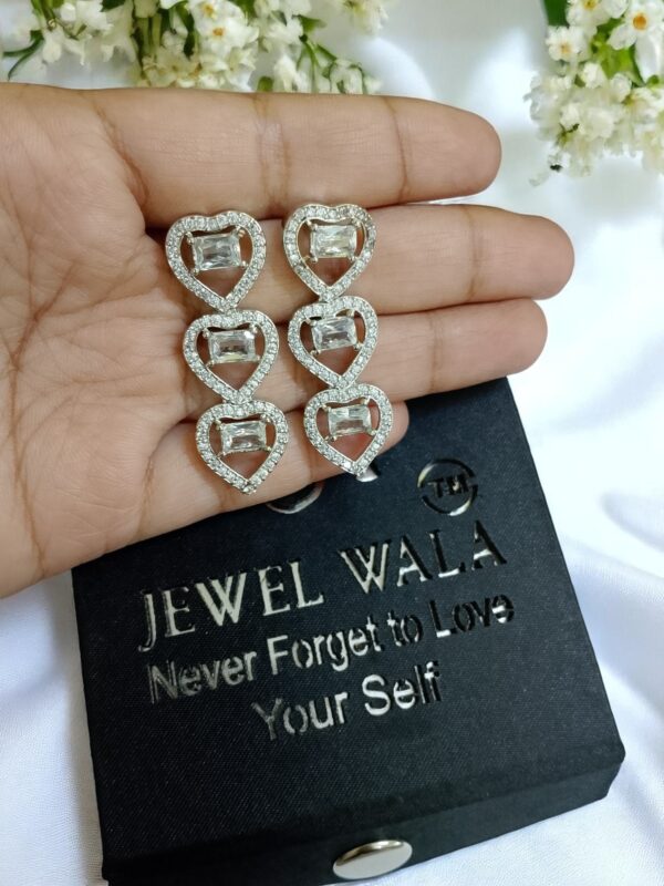 White Ad Stone Earring Pair - Image 2